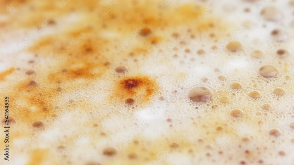 Coffee foam close-up. Cappuccino foam, foam with bubbles, macro video. Coffee foam close-up. Cappuccino foam, foam with bubbles, macro video.