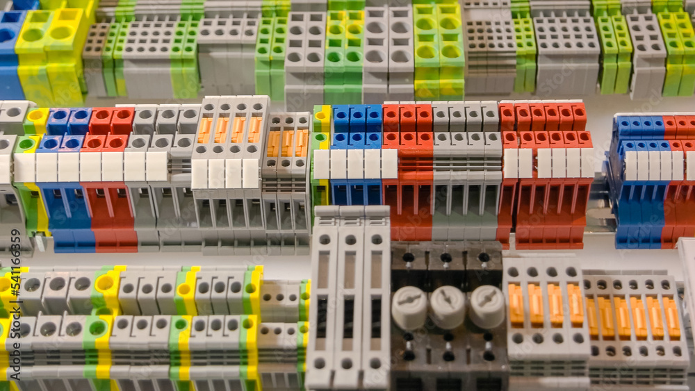 Close-up large electrical terminal block machine panel. Quick connect and release terminal connector. Close-up large electrical terminal block machine panel. Quick connect and release terminal connector.