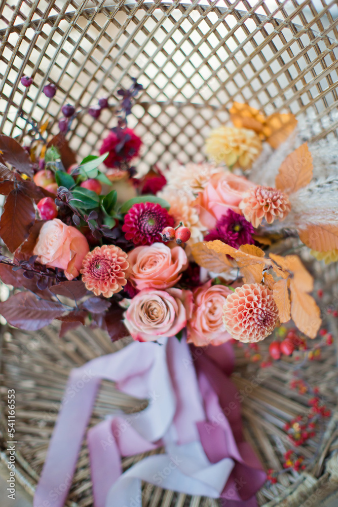 Autumn wedding bouquet with ribbons