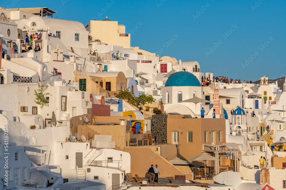 Colorful buildings on a hillside at Oia town on Santorini island in Greece