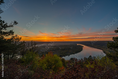 Sunset on the Dniester River in autumn photo