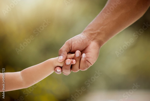 Care, support and holding hands for youth, trust and generation against a blurred background. Hand of parent and child arms in caring relationship, help and love for childhood growth and development © J Maas/peopleimages.com