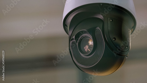 Photography Close-up of surveillance video camera rotating around