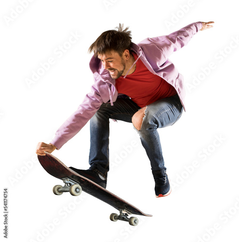 Skateboarder doing a jumping trick. Isolated
