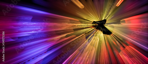 Abstract 3D illustration of glowing bright purple yellow red neon light streaks in motion. Visualization of data transfer  rapid movement or cyberspace on black background