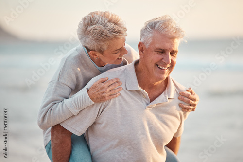 Foto Senior couple, piggy back and beach retirement, summer vacation or sunshine holiday together in outdoor Australia nature