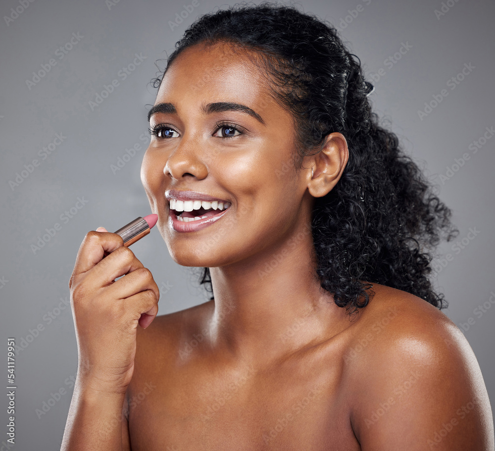 Fotka „Lipstick, woman and lip cosmetics, makeup and smile in a mockup grey  studio background. Beauty girl model happy with health, wellness and  skincare with healthy, glowing and smooth skin results“ ze