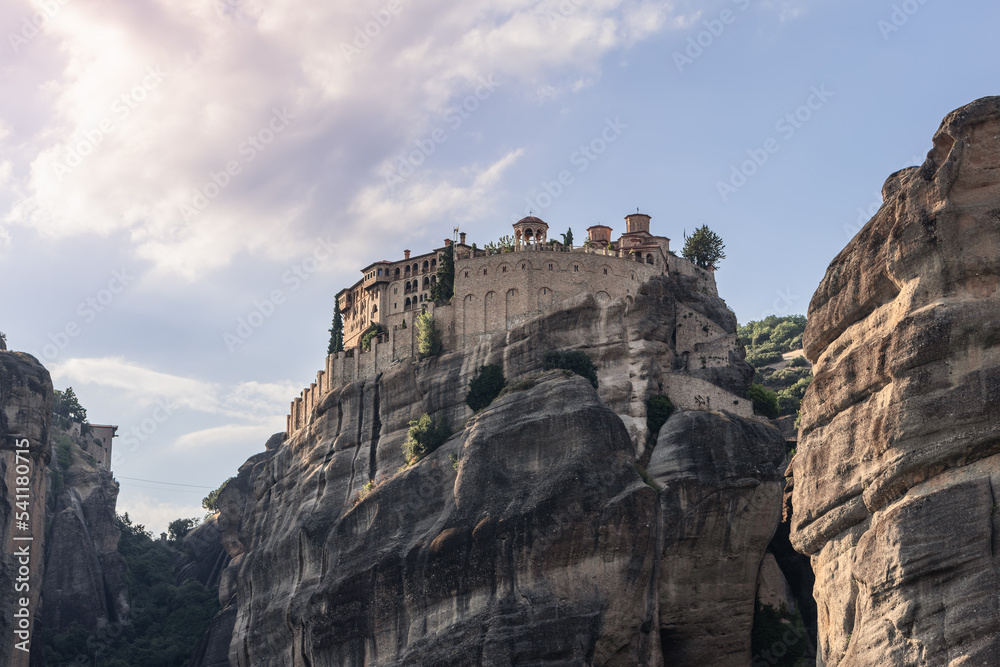 The Holy St. Varlaam Monastery in the rays of the setting sun. Meteora, Greece.
