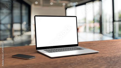 Laptop mockup isolated with transparent screen png on table with office background
