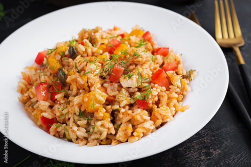 Tomato rice with vegetables and chicken. Healthy food. Healthy lifestyle.