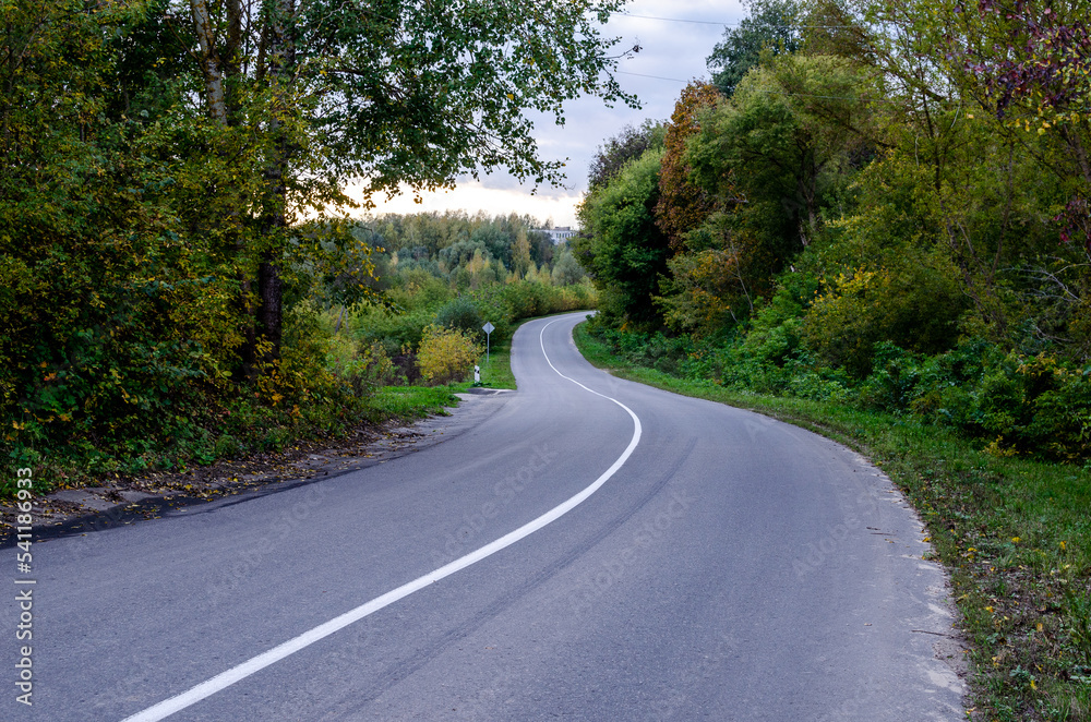 Asphalt road from the hill in the countryside. Asphalt road from the hill in the countryside.