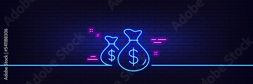 Neon light glow effect. Coins bags line icon. Cash money sign. Income savings symbol. 3d line neon glow icon. Brick wall banner. Coins bags outline. Vector