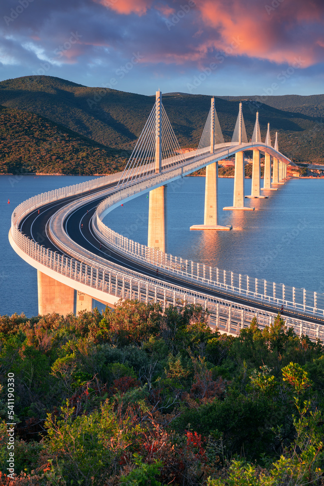 Peljesac Bridge, Croatia. Image of beautiful modern multi-span cable-stayed Peljesac Bridge over the sea in Dubrovnik-Neretva County, Croatia at sunrise.