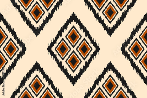 Fabric ethnic Aztec style. Ethnic ikat seamless pattern in tribal. Design for background, wallpaper, illustration, fabric, clothing, carpet, textile, batik, embroidery.