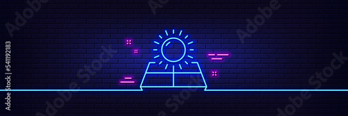 Neon light glow effect. Sun energy line icon. Solar panels sign. Ecology power symbol. 3d line neon glow icon. Brick wall banner. Sun energy outline. Vector