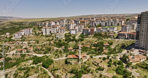 Ankara Turkey Aerial v8 low level drone flyover across kayaş and yeşilbayır neighborhoods capturing housing area with hillside residential apartment blocks - Shot with Mavic 3 Cine - July 2022 photo