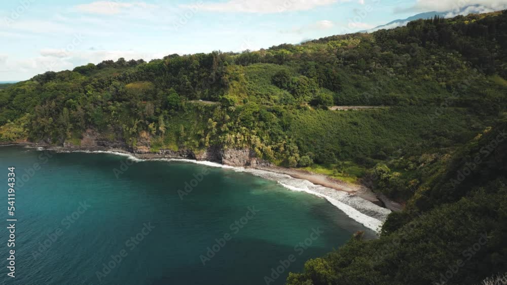 Drone video of beach alongside the road to Hana in Maui Hawaii on a sunny day Drone video of beach alongside the road to Hana in Maui Hawaii on a sunny day