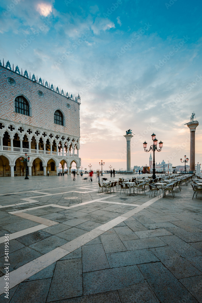 St. Mark's Square at dawn with trails of people walking