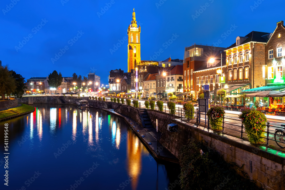 Beautiful night scene of Roermond with view to the river and town. Netherlands