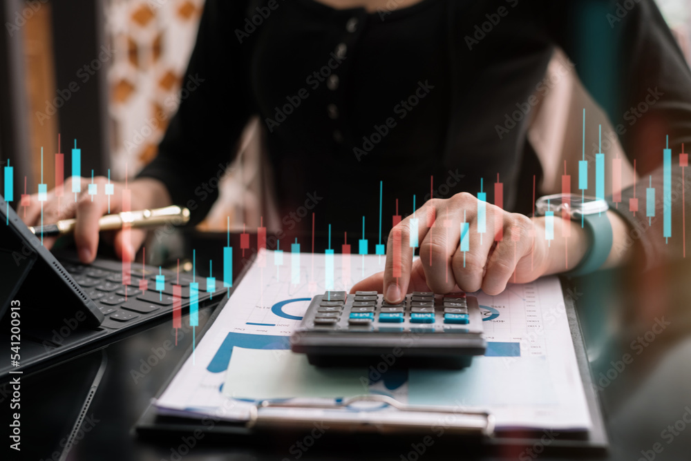 Business and financial concepts about office work. Analysts discuss business with a calculator as a tool. Business and financial concepts about office work. Analysts discuss business with a calculator as a tool.