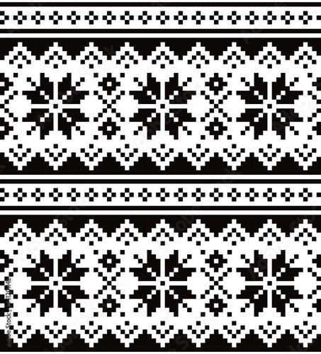 Christmas winter vector seamless black and white pattern with snowflakes, inspired by Sami people, Lapland folk art design, traditional knitting and embroidery
