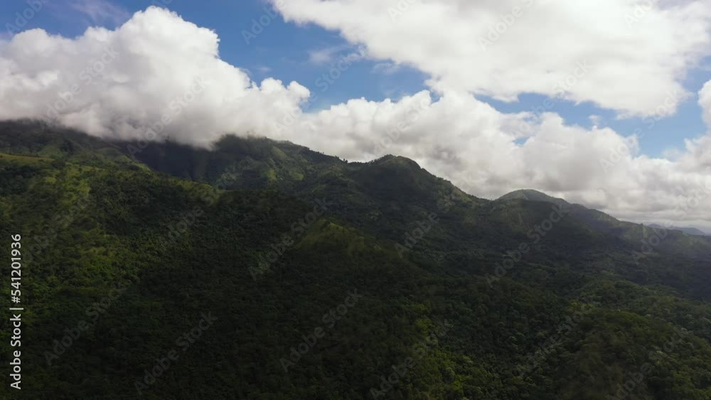 Aerial view of Tropical mountain range and mountain slopes with rainforest. Sri Lanka. Aerial view of Tropical mountain range and mountain slopes with rainforest. Sri Lanka.