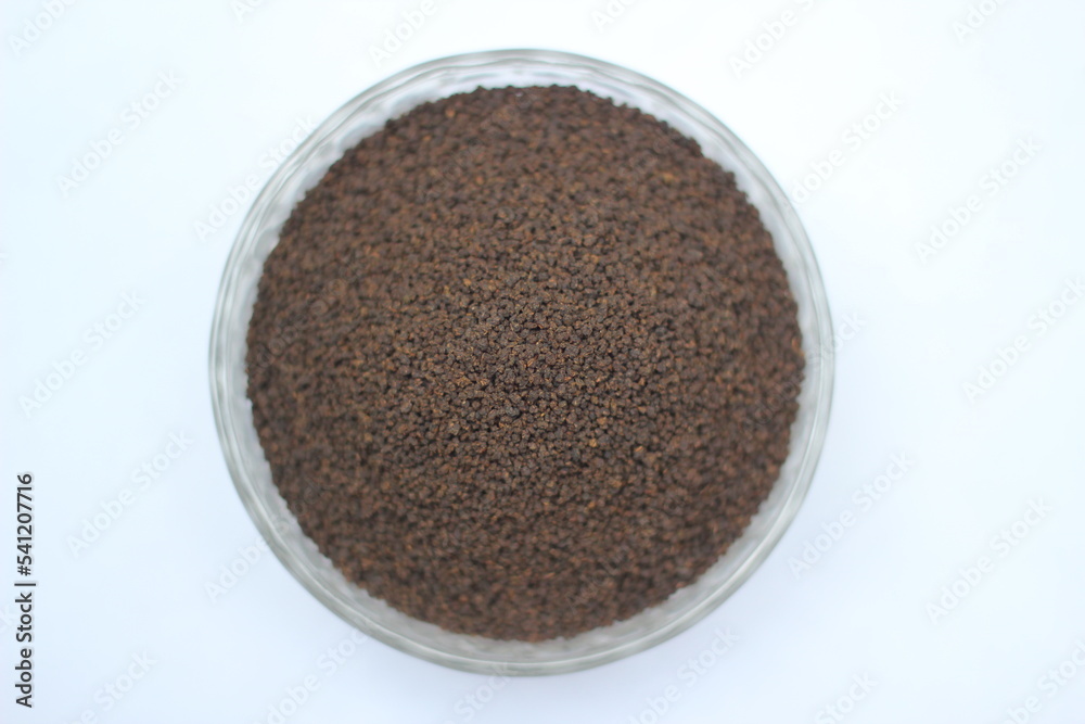 Dry black tea leaves decorated on white background Dry black tea leaves decorated on white background