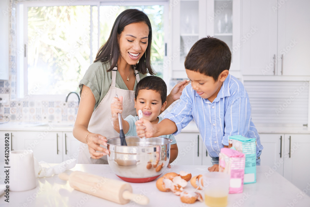 Baking, kids and mom in the home kitchen cooking food with a boy and baby with happiness. Family, mother and happy children smile at a house teaching with ingredients together smiling in family home