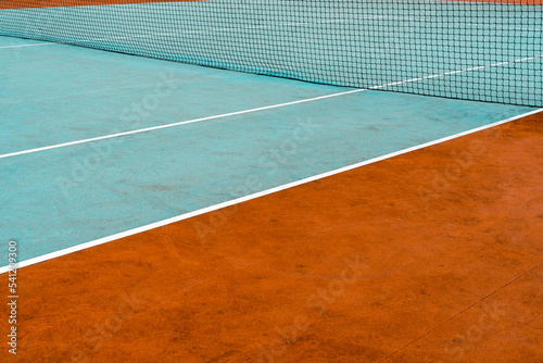 Colorful rubberized tennis court with a mesh © graja