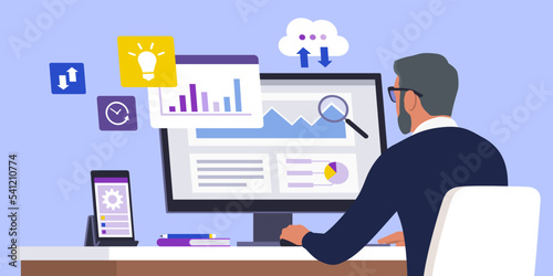 Senior businessman checking financial reports online