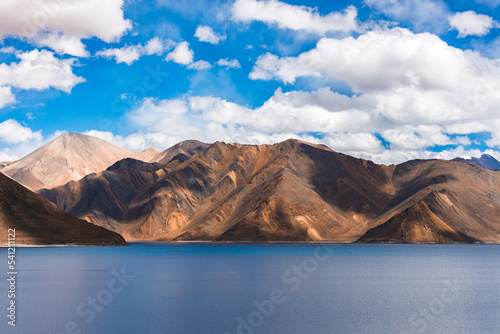 Landscape scene of Pangong Lake in autumn season with mountain and blue sky at Leh, Ladakh, India.