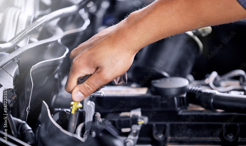 Engineering, repair and mechanic working on a car, doing a service and check for problem with the engine at a workshop. Hands of a transportation technician doing maintenance on a van or vehicle Engineering, repair and mechanic working on a car, doing a service and check for problem with the engine at a workshop. Hands of a transportation technician doing maintenance on a van or vehicle