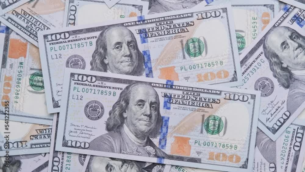 Counting money. Pile of american dollars. Dollar banknotes appearing one by one. New hundred dollar bills. Inflation and deflation concept. Hundreds usd. Money pattern. Close-up in 4K