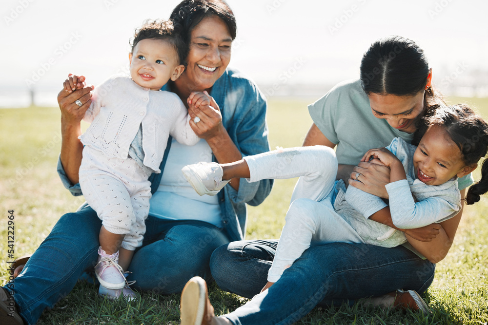 Family, love and outdoor park with children, mother and grandmother on grass laughing, fun and bonding on summer adventure. Nature, energy and support of generation women on vacation with happy kids