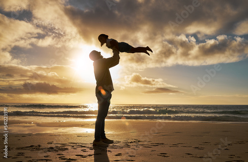 Beach silhouette  father and child play  bond or enjoy fun quality time together in Rio de Janeiro brazil. Happy family love  sunset flare of freedom peace for dad and youth kid playing on ocean sand