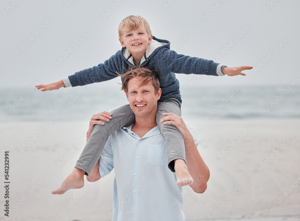Child, dad and piggy back on beach on a family holiday ocean walk in Australia. Travel, fun and a portrait of happy father and son with smile playing on sea sand on vacation with open sky and waves. Child, dad and piggy back on beach on a family holiday ocean walk in Australia. Travel, fun and a portrait of happy father and son with smile playing on sea sand on vacation with open sky and waves.