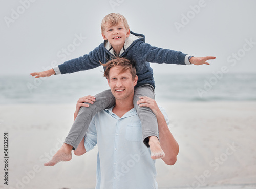 Foto Child, dad and piggy back on beach on a family holiday ocean walk in Australia