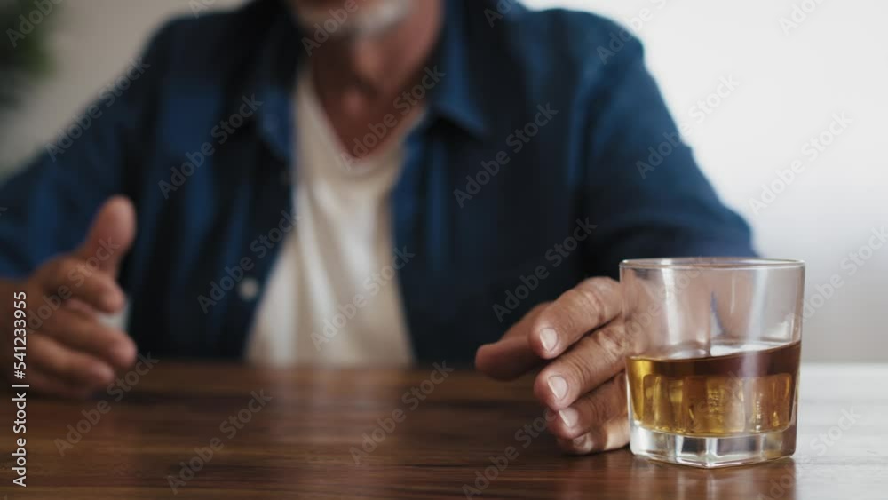 Senior caucasian man with alcohol problem. Shot with RED helium camera in 8K. Senior caucasian man with alcohol problem. Shot with RED helium camera in 8K.