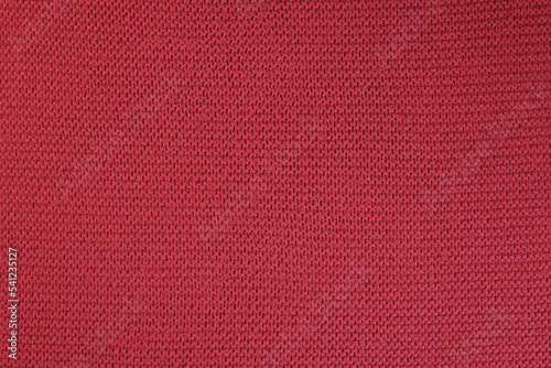 Red knitted fabric texture background