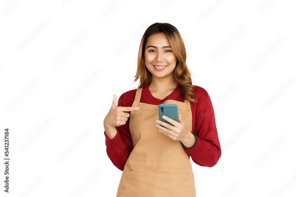 Coffee shop SME owner excited brunette asian woman wearing sweater and apron isolated on white background, Using mobile Coffee shop SME owner excited brunette asian woman wearing sweater and apron isolated on white background, Using mobile