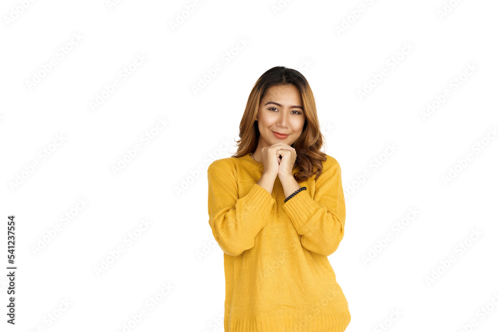 Attractive positive young asian brunette woman in yellow sweater on white background. Attractive positive young asian brunette woman in yellow sweater on white background.