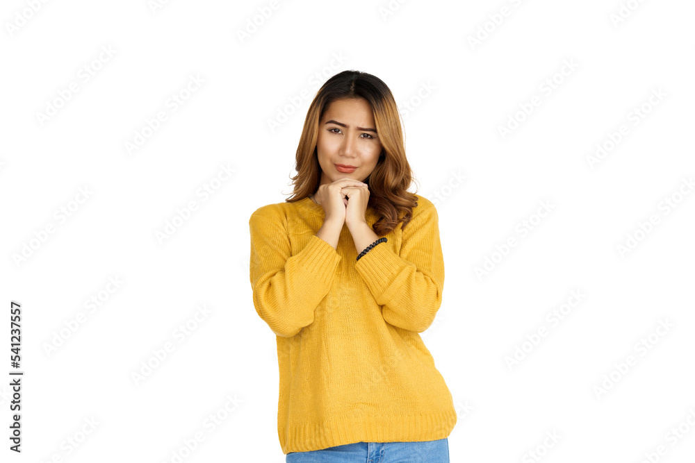 Attractive positive young asian brunette woman in yellow sweater on white background. Attractive positive young asian brunette woman in yellow sweater on white background.