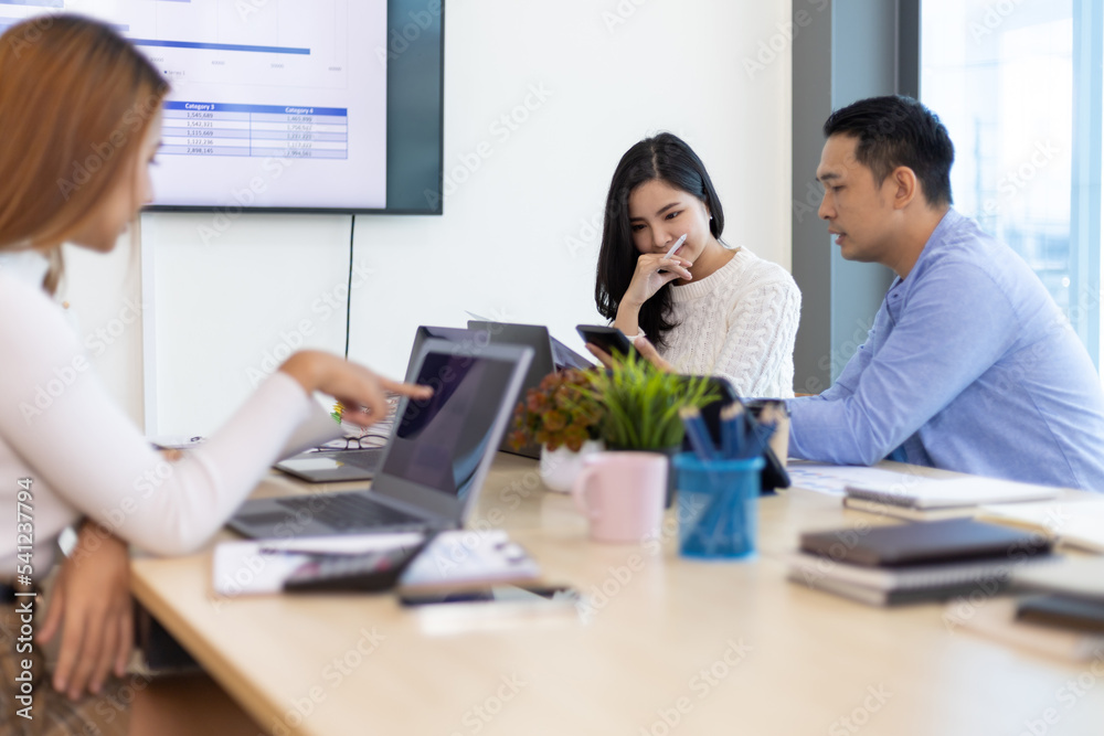Young people meeting to discuss successful business projects in the office. Human relations and working with colleagues in the organization happily. Young people meeting to discuss successful business projects in the office. Human relations and working with colleagues in the organization happily.