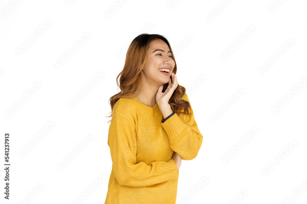 Attractive positive young asian brunette woman in yellow sweater on white background. wow or surprised Attractive positive young asian brunette woman in yellow sweater on white background. wow or surprised