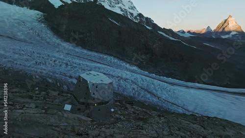 The Monte Rosa hut in Switzerland alps. Drone flight to the right