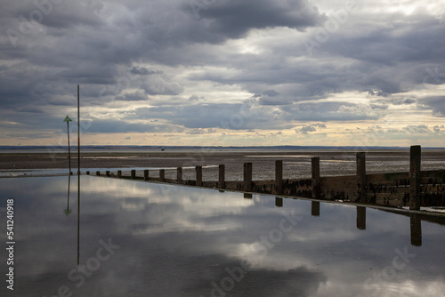 Moody reflections on Chalkwell Beach, near Southend-on-Sea, Essex, England, United Kingdom © chillingworths