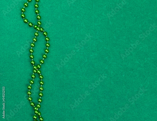 Green necklace preparing for St Patrick day © xiaoliangge