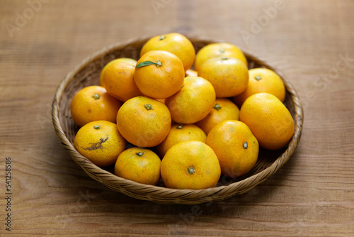 fresh organic Wenzhou mandarin orange, citrus unshiu, satsuma mandarin, unshu mikan photo