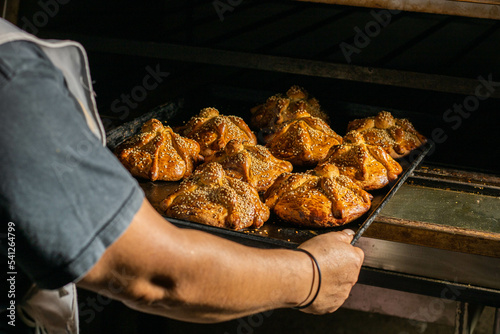 Fotografie elaboration of bread of the dead, november 2, mexican tradition, mexican bread w