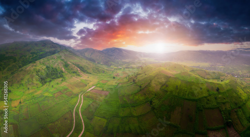 Aerial view of Chu Dang Ya volcano mountain with Da Quy flower or Tithonia diversifolia flower near Pleiku city, Gia Lai province, Vietnam photo